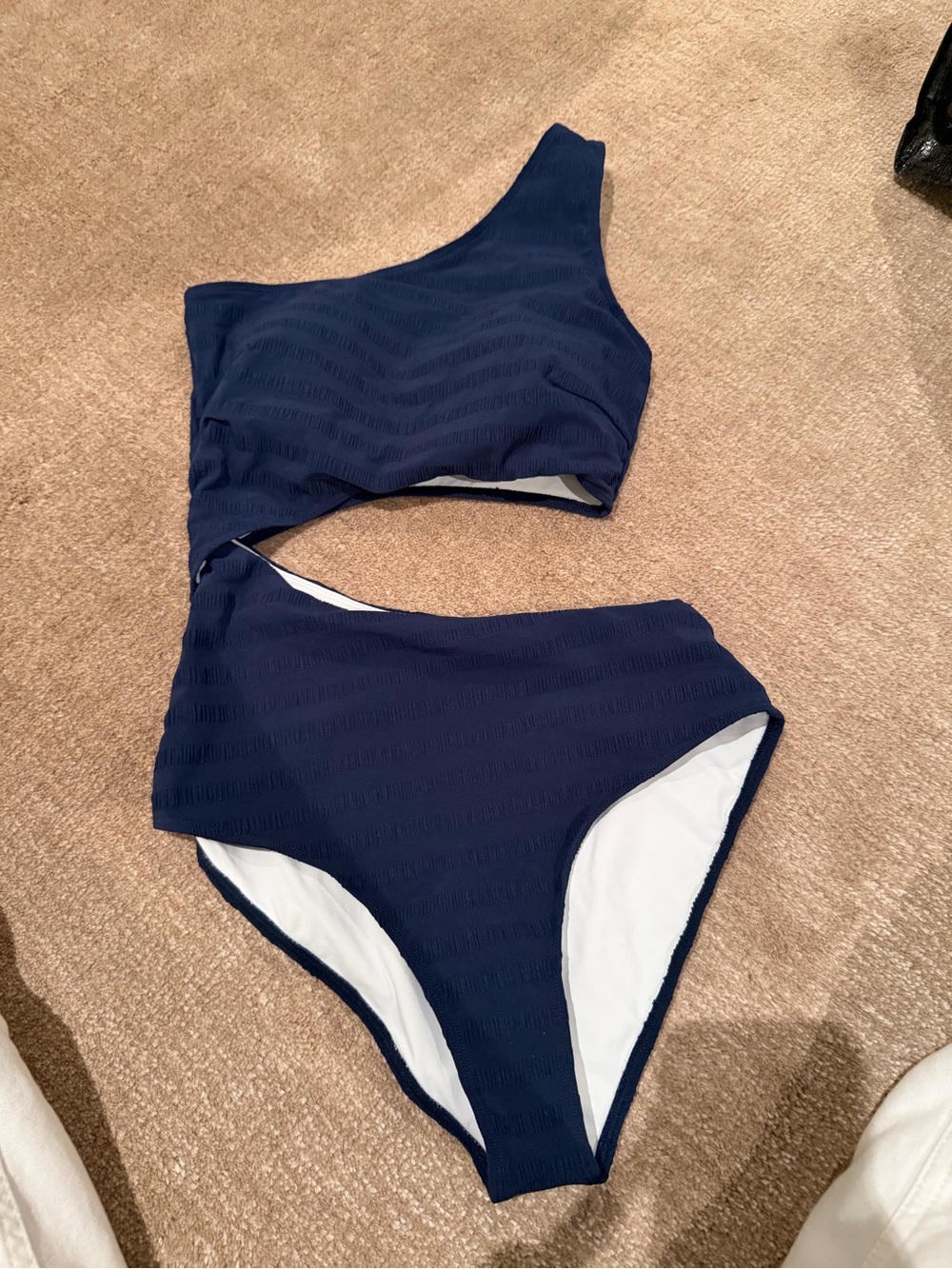 One-piece swimwear classification